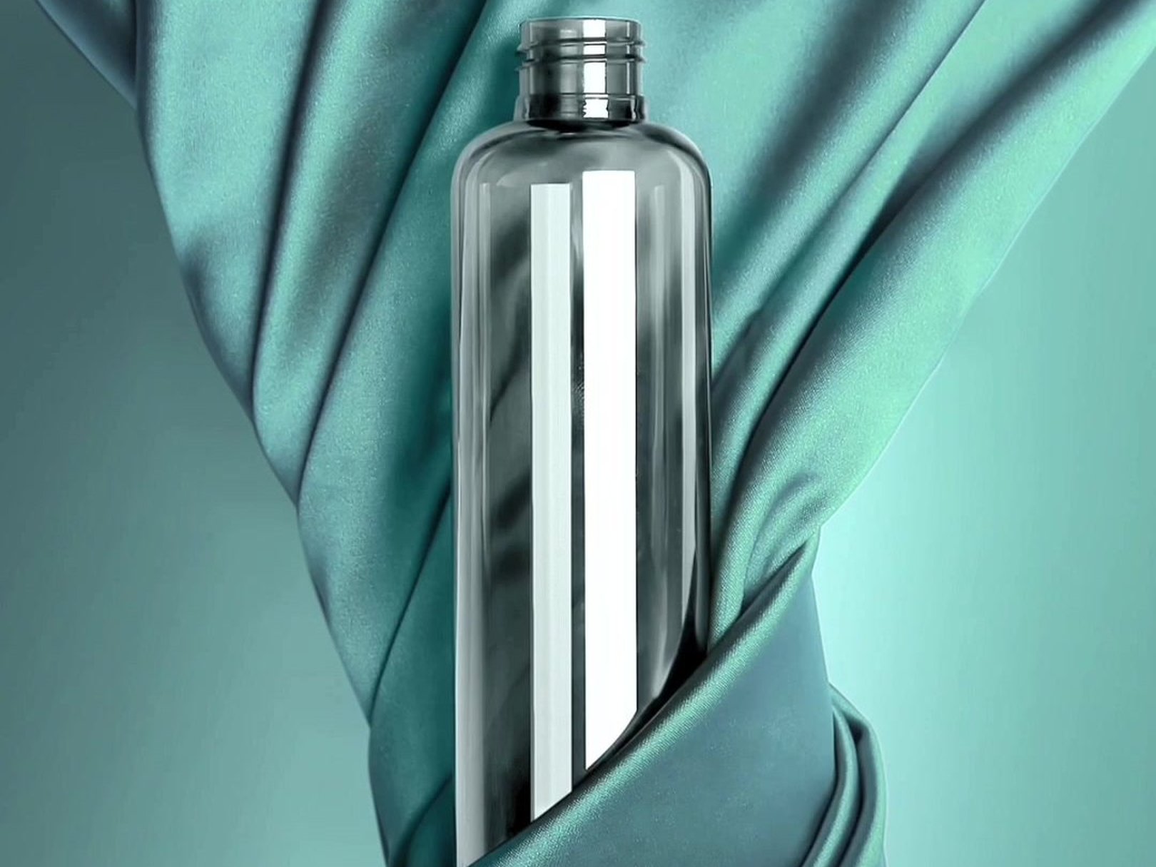 Clear PackGroup bottle on turquoise fabric